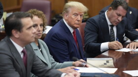 Former President Donald Trump sits at the defense table with his legal team in a Manhattan court, Tuesday, April 4, 2023, in New York. Trump is appearing in court on charges related to falsifying business records in a hush money investigation, the first president ever to be charged with a crime.