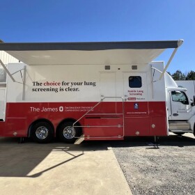A red and white truck offers mobile lung cancer screenings.