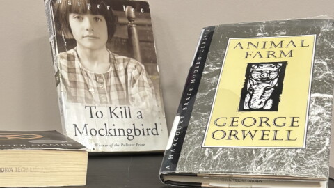 A display of notable books that have been banned is shown as part of National Banned Books Week events at WITCC in Sioux City on October 8, 2026. (Bret Hayworth, Siouxland Public Media News)