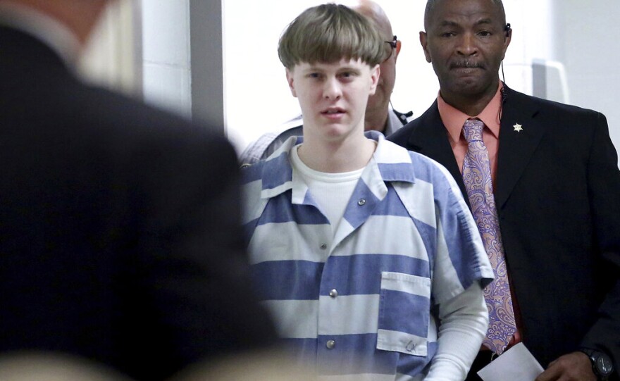 FILE - In this April 10, 2017, file photo, Dylann Roof enters the courtroom at the Charleston County Judicial Center in Charleston, S.C. On Tuesday, May 25, 2021, Roof, on federal death row for the racist slayings of nine members of a Black South Carolina congregation, is making his appellate argument that his conviction and death sentence should be overturned. (Grace Beahm/The Post And Courier via AP, Pool, File)