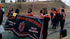 The Washington High entry prepares to the Tulsa parade.