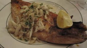 Pompano with crab meat and butter, a Creole classic at Galatoire's Restaurant.
