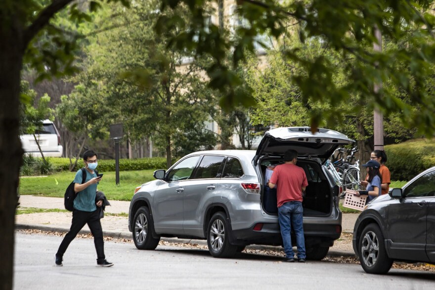 Students pack up to leave campus because of the coronavirus.