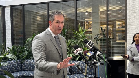 Rep. Johnny Olszewski speaking to reporters in Towson on Nov. 10, 2025.