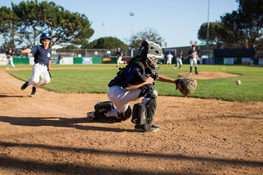Playing catcher, Jake makes a play at home base during a practice at the Bad News Bears Field in Los Angeles.