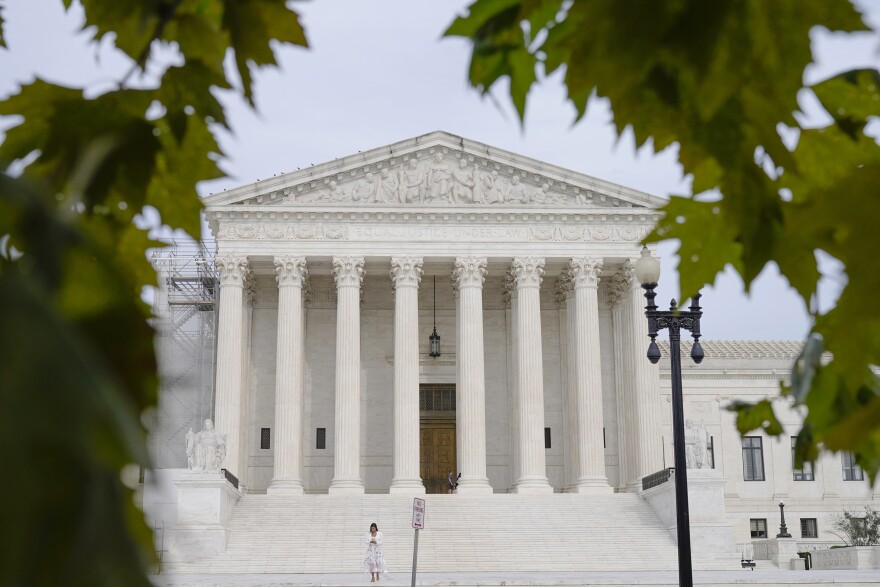 The U.S. Supreme Court is seen, Wednesday, Aug 30, 2023, in Washington. The Supreme Court is taking up a case Wednesday that could make it harder to sue hotels when their websites are not clear enough about their accommodations for people with disabilities.