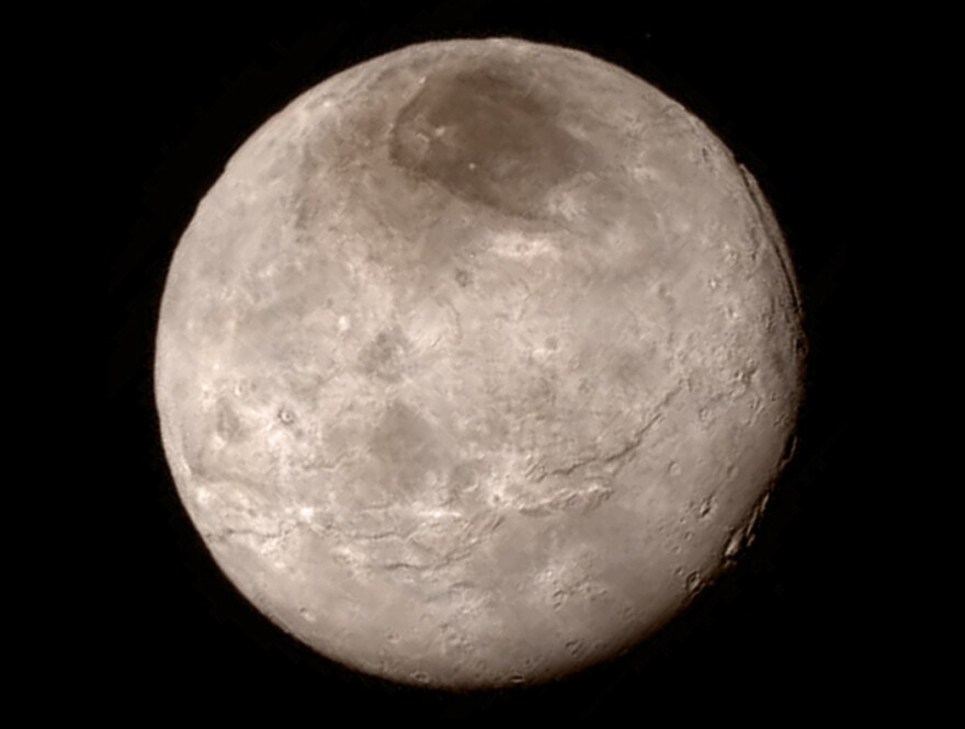 New details of Pluto's largest moon, Charon, are revealed in this image from New Horizons' Long Range Reconnaissance Imager.