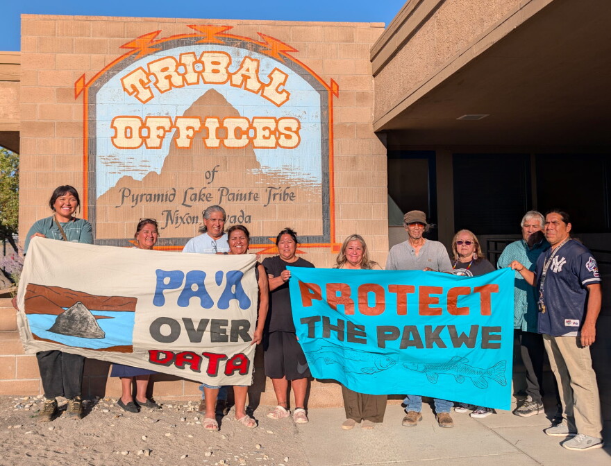 Members of the Pyramid Lake Paiute Tribe and the Water Over Data Alliance stand in front of the Tribal Offices in Nixon, Nevada on August 21.
