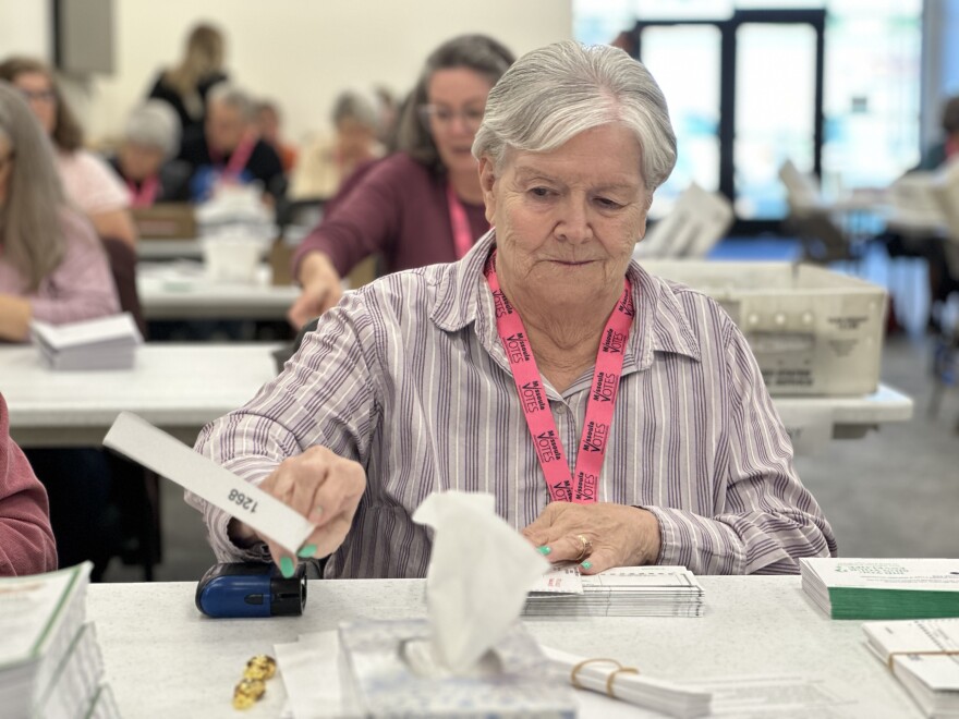 Missoula county election assistant Doris Walther preps mail ballots for the 2022 midterm elections.