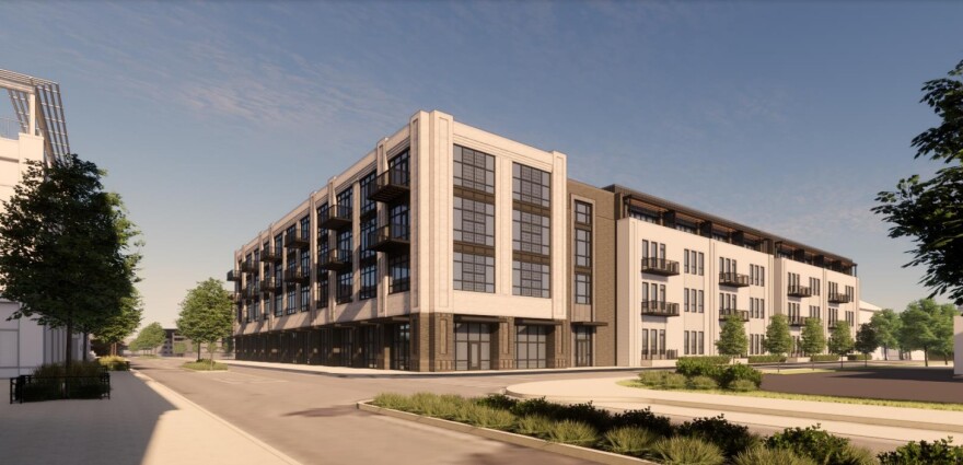 Developer WeImpact Group's rendering of an apartment building, with ground-floor retail and office, it plans to build at Jackson Boulevard and NIBCO Parkway in downtown Elkhart's River District. The developer plans to spend $38 million, while the city agrees to spend $9 million on a parking garage inside the U-shaped structure.