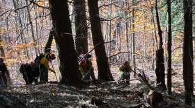 Fire crews are continuing to put out the fire Wednesday after completely containing it Tuesday night.