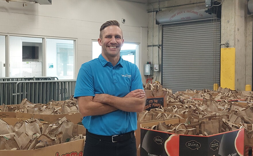 Cameron Barrett, Head of Communications and Public Affairs for Kroger’s Michigan Division, at an event giving away food packs at the George Gervin GameAbove Center on October 27, 2026.