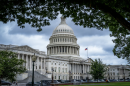 The Capitol is seen under dark skies in Washington, Tuesday, July 15, 2025.