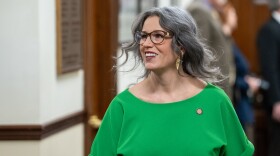 Sen. Kelly Merrick, R-Eagle River, walks toward the House chamber in the Alaska State Capitol on Jan. 30, 2024. (Eric Stone/Alaska Public Media)