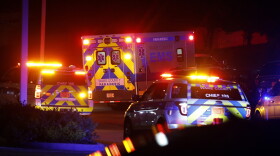 An ambulance believed to be carrying a shooting suspect arrives at Wake Medical Center Emergency Room in Raleigh, N.C., Thursday, Oct. 13, 2022, surrounded by police. North Carolina Democratic legislators pleaded with the General Assembly's Republican majority on Tuesday, Oct. 18 to consider gun safety and mental health measures, citing shootings in Raleigh that left five people dead. (AP Photo/Karl DeBlaker, File)