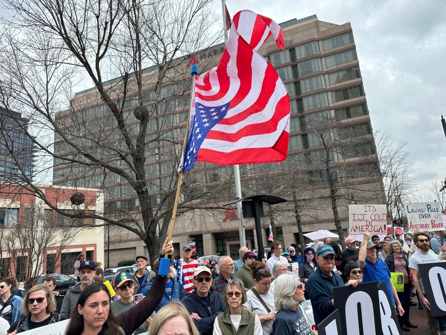 People gather during a protest on Saturday, Jan. 10, 2026 in downtown Durham, NC.
