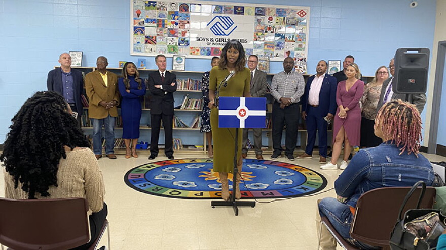 Jasmin Shaheed-Young, RISE INDY president, stands among community members as they announce the Circle City Readers initiative.