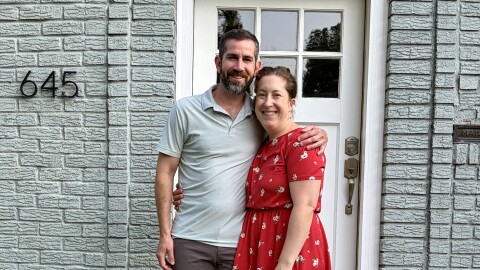 Ryan and Brittany Arthur stand in front of their new Kansas City, Missouri, is this undated photo. The Arthurs relocated from Portland, Oregon, in early June 2026.
