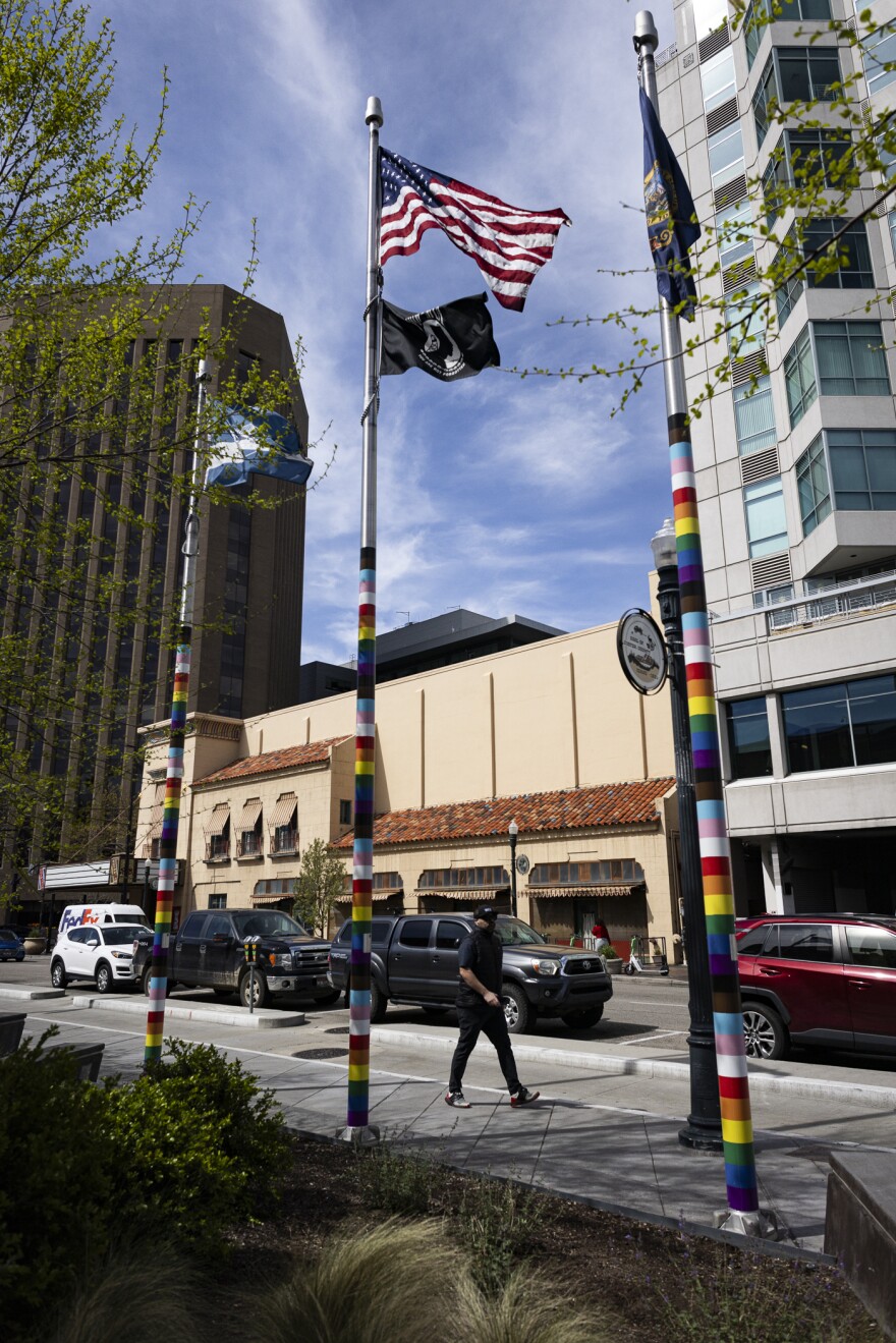 The flagpoles in front of Boise city halls wrapped in the Pride colors