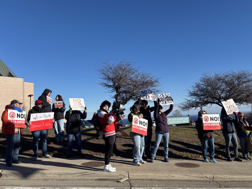 A crowd in Duluth protests Nov. 15, 2025, against the proposed Hermantown data center.