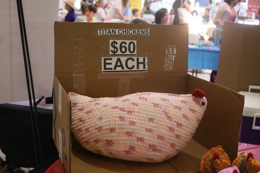 Jayden Priests, The Plush Portal, booth featuring his handmade “Titan Chicken.” Photo by Allison Diaz.