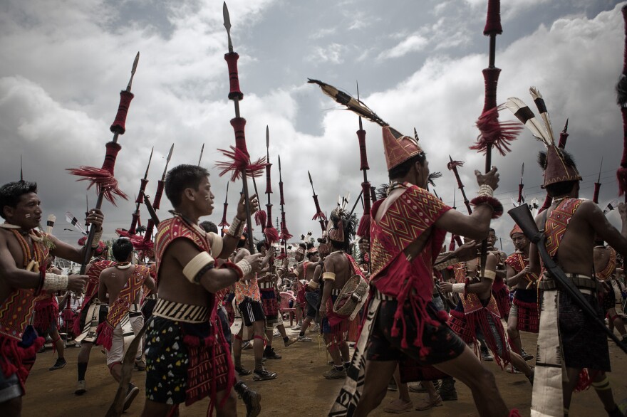 Young Konyak men celebrate a festival. The younger generation prefers body paint to tattoos.