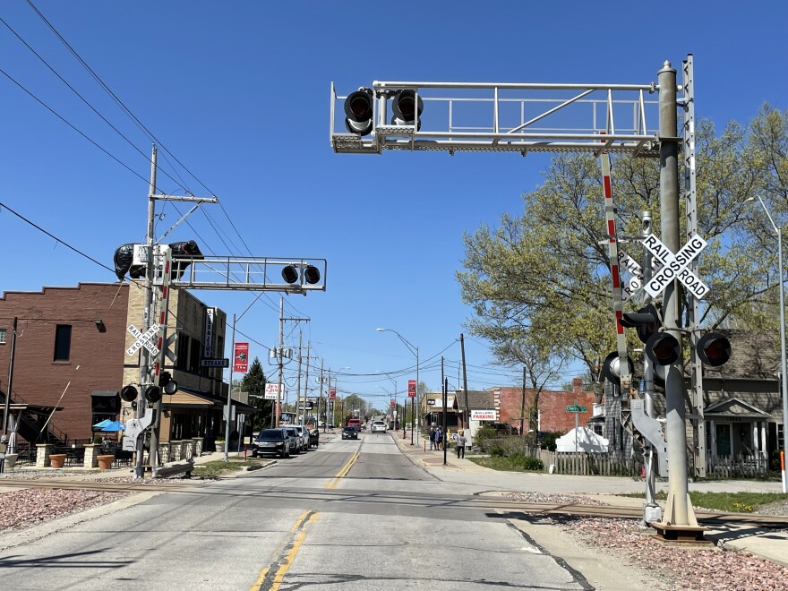 A view of 135th Street looking west from a railroad crossing. 