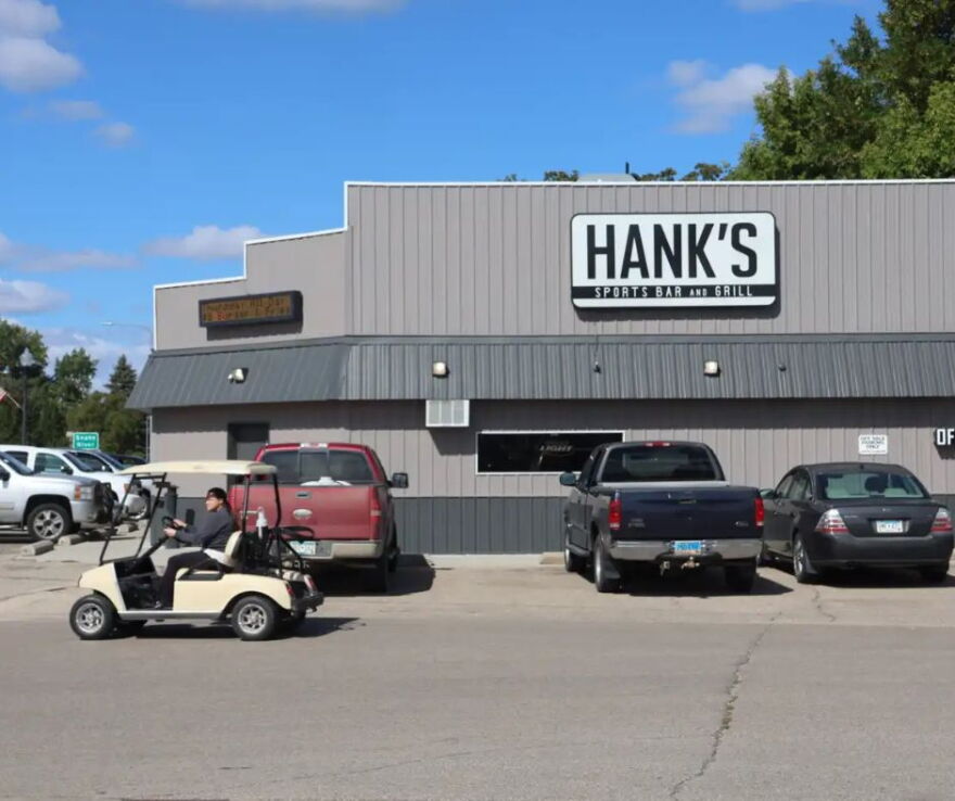 The owner of Hank's Sports Bar and Grill said that people who drove to visit the drive-in would often pass by to grab a meal and drink | MPR News