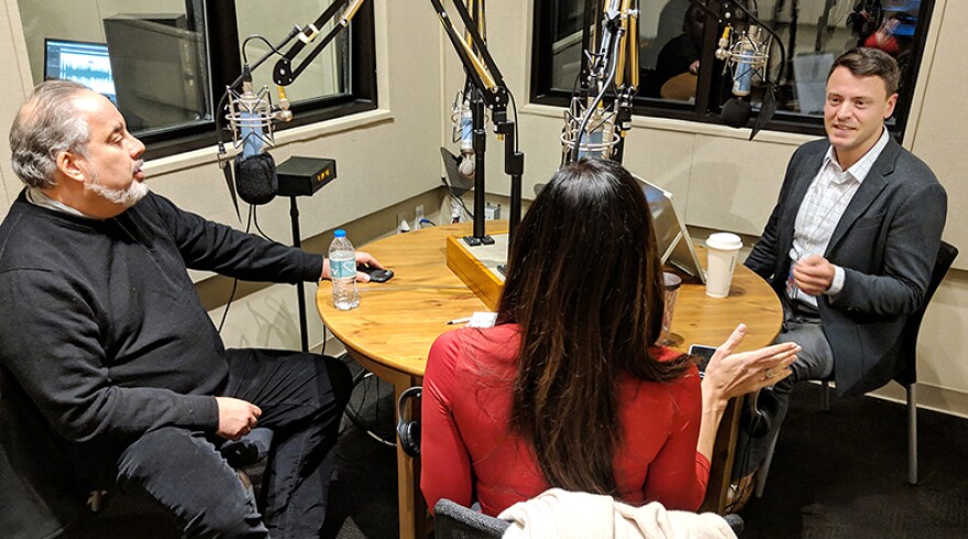 Gavin Jackson (r) speaks with Andy Shain (l) and Meg Kinnard in the South Carolina Public Radio studios on Monday, January 14, 2019.