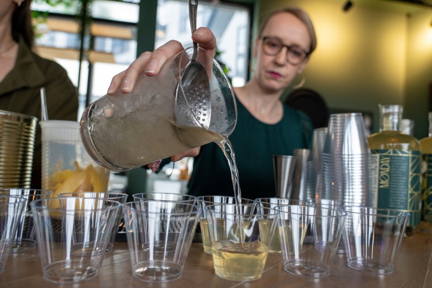 Festival volunteer Erin Petrey pours nonalcoholic martinis during bartender Derek Brown's master class at the Mindful Drinking Fest in Washington, D.C., on Jan. 21.