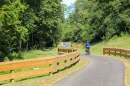 People ride along a bike trail in Fairfield. The city has secured grant funding to extend the Great Miami River Recreation Trail to Marsh Park.