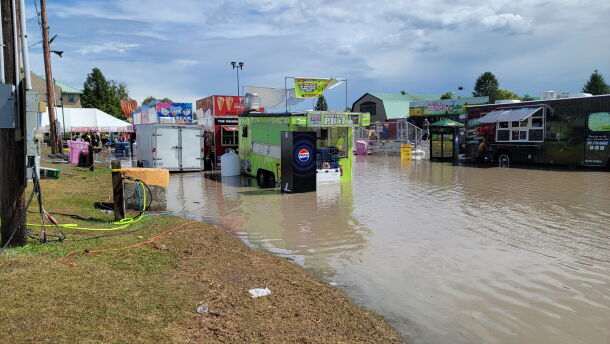 Flooding along Restaurant Row at the New York State Fair. Photo taken around noon.