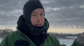 Patrick Carey of Lakewood took a few steps out onto Lake Erie's frozen surface at Edgewater Park. Walking on the ice will become increasingly dangerous as temperatures warm.R