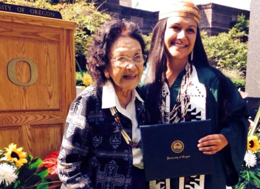 In this 2014 photo, Emilee Risling (right) poses at her University of Oregon graduation ceremony with her great-aunt and adoptive grandmother, Viola Risling-Ryerson (center.) 