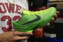 Davon Artis holds a pair of Kobe 6 Grinch shoes, released in 2010. The shoes more than doubled in value within hours of Bryant's death.