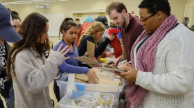 Miami students search for supplies during a marketing class project.