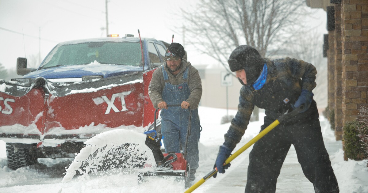 Snow piles up across the Kansas City metro as schools, government offices and businesses close | KCUR