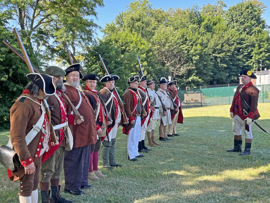 Uniformed members of the 24th Connecticut Militia reenactment group gather near the Wyoming Monument in the Borough of Wyoming during an annual ceremony commemorating those who died in the 1778 Battle and Massacre of Wyoming. The yearly ceremony in Luzerne County began in 1878, on the centennial of the battle. This year's observance will be held at the monument on Wyoming Avenue, Wyoming, at 10 a.m. Saturday, July 4, 2026.