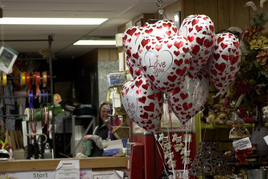 Valentine's Day decorations are seen inside Mary M’s Walnut House Flowers.