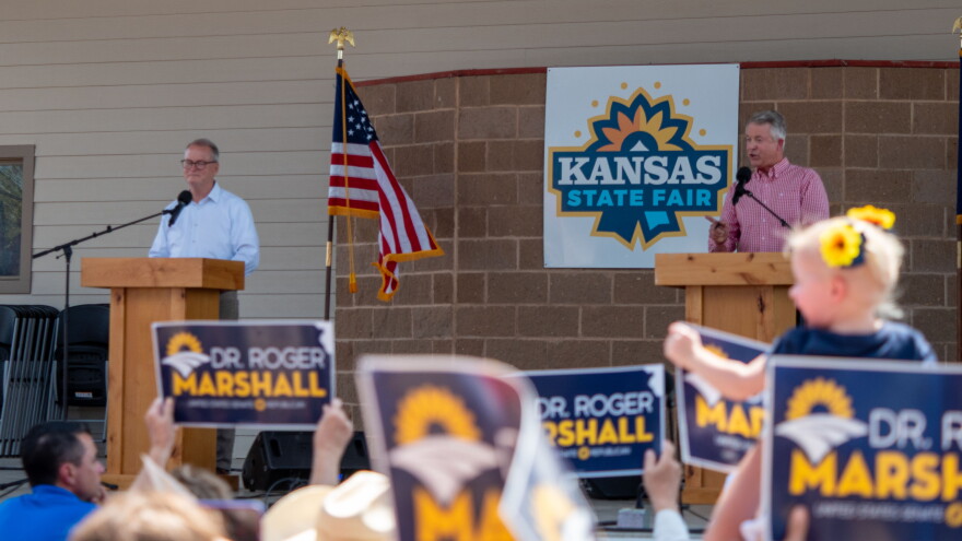 Democratic pastor Adam Hamilton and Republican U.S. Sen. Roger Marshall debate Sept. 12, 2026, at the Kansas State Fair in Hutchinson.