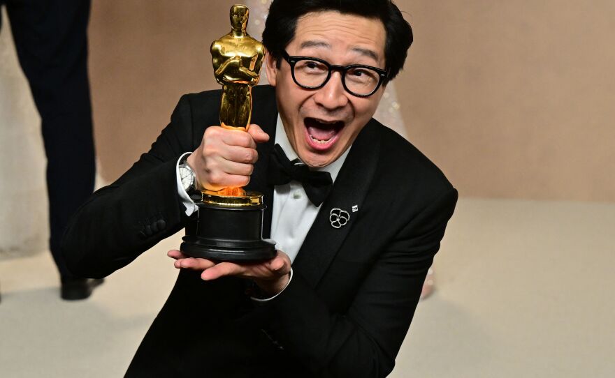 Ke Huy Quan poses with the Oscar for Best Actor in a Supporting Role for "Everything Everywhere All at Once" in the press room during the 95th Annual Academy Awards at the Dolby Theatre in Hollywood, California on March 12, 2023.