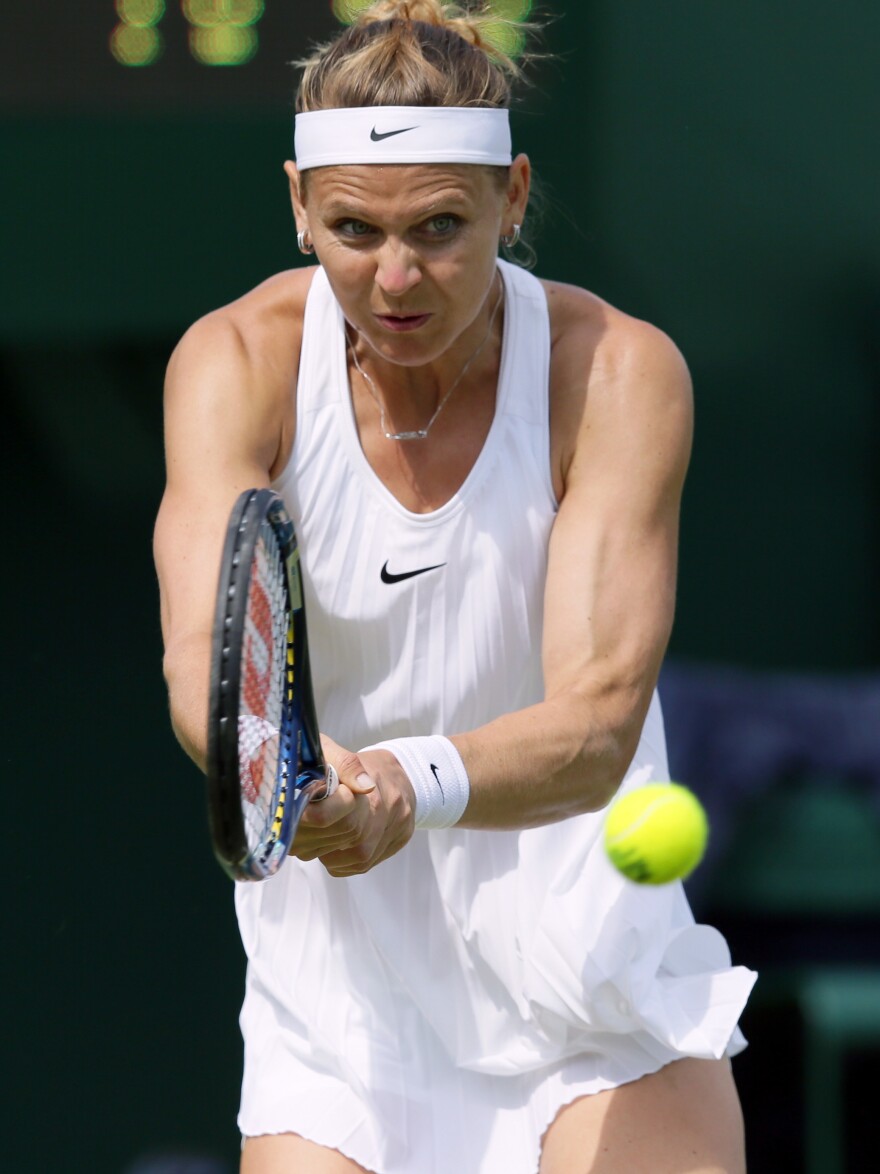 Lucie Safarova of the Czech Republic wore the pleated tennis dress without incident in the first round of Wimbledon.