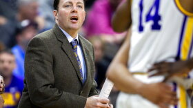 FILE - Then-LSU assistant coach Greg Heiar, center, shouts from the sideline during the team's NCAA men's college basketball tournament game against Yale in Jacksonville, Fla., March 21, 2019. New Mexico State suspended operations of its men's basketball program indefinitely Friday night, Feb. 10, 2023, and placed its coaching staff, including Heiar, on paid administrative leave. ( AP Photo/Stephen B. Morton, File)