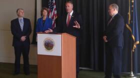 Flanked by Senator Lisa Murkowski and Governor Bill Walker, Interior Secretary Ryan Zinke speaks to reporters after signing an order to promote more drilling on Alaska’s North Slope. (Photo by Elizabeth Harball/Alaska’s Energy Desk)