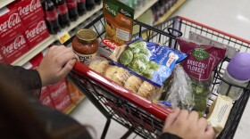 Jaqueline Benitez, who depends on California's SNAP benefits to help pay for food, shops for groceries at a supermarket in Bellflower, California on Feb. 13, 2023.