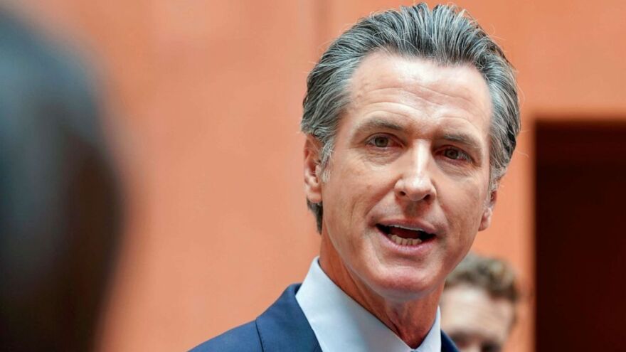 California Gov. Gavin Newsom responds to a question while meeting with reporters after casting.