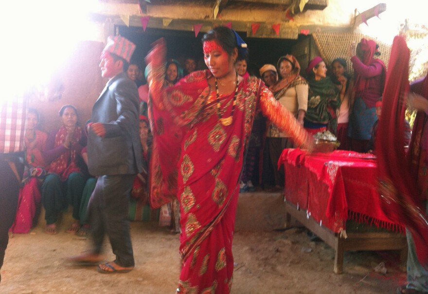 A bride and groom dance at a wedding. Of course, all the guests will join in.