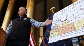 North Dakota Game and Fish Department Director Jeb Williams gestures during an Oct. 19, 2026, news conference.