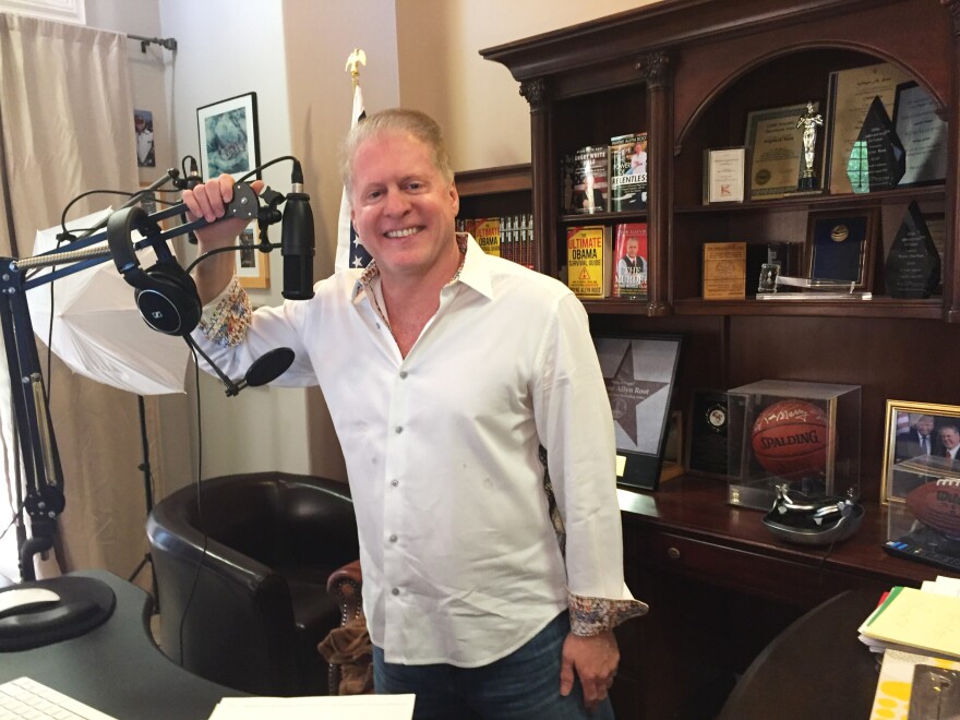 Wayne Allyn Root hosts a conservative talk radio show from his home studio.