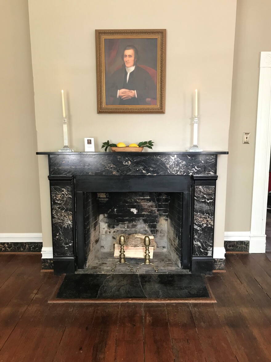 A portrait of Charles Washington, founder of Charles Town, W.Va. hangs on the wall in one of the first floor rooms of the Happy Retreat mansion.